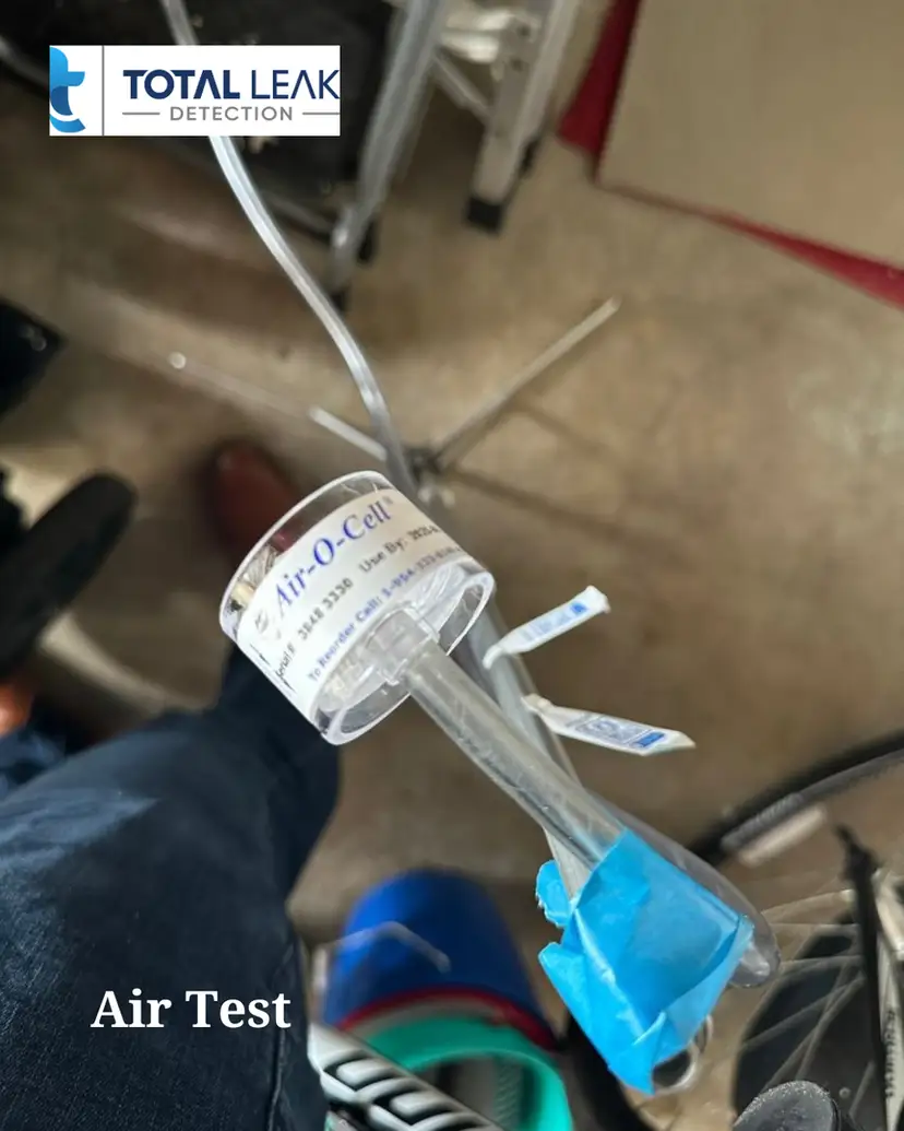 Air test equipment used during shower leak and mold assessment in Miami-Dade